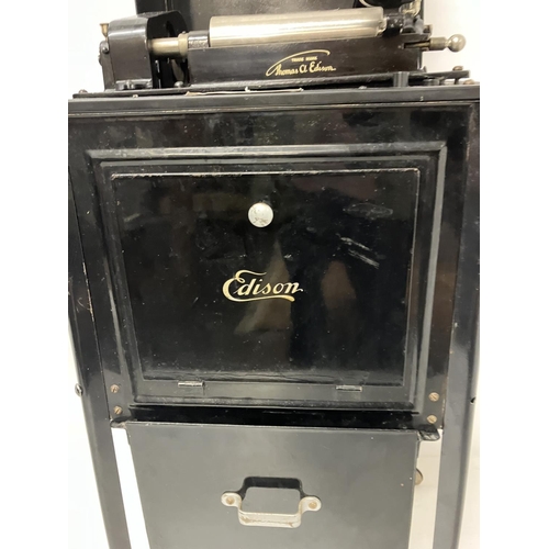 279 - Edison Bell - A rare early antique Phonograph by Thomas Edison in black metal casing with a collecti... 