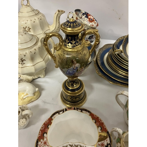 28 - Mixed lot of china ware to include moustache cup and saucer, etc.