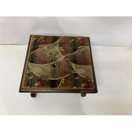 298 - A 19th century mahogany X framed stool.