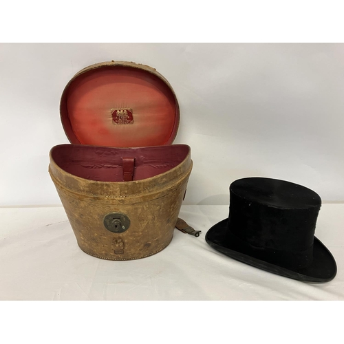 30 - Old top hat with original leather case. The hat supplied by the Army & Navy Co-Operative Society, Lo... 