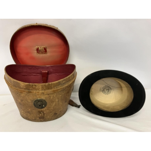 30 - Old top hat with original leather case. The hat supplied by the Army & Navy Co-Operative Society, Lo... 