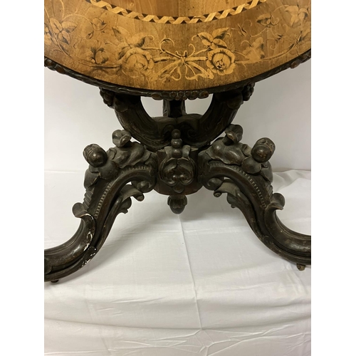 300 - A good 19th century circular table, the extensive inlaid top having carved border and raised on simi... 