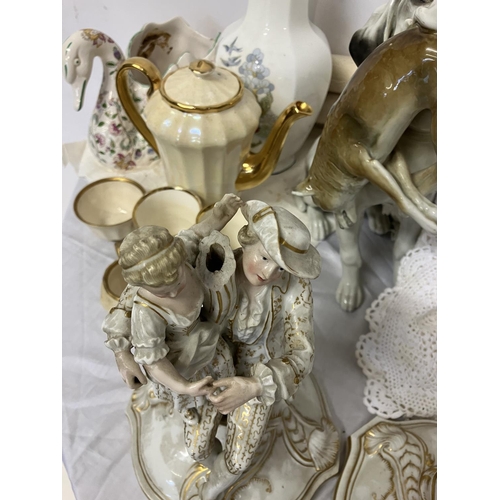 303 - A large mixed lot to include porcelain & china ware as found, two canvas paintings unframed and quan... 