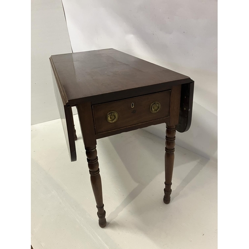 309 - 19th century mahogany drop leaf table fitted with a drawer and raised on ring turned legs.  L. 110cm... 