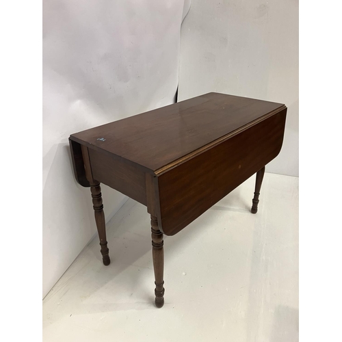 309 - 19th century mahogany drop leaf table fitted with a drawer and raised on ring turned legs.  L. 110cm... 