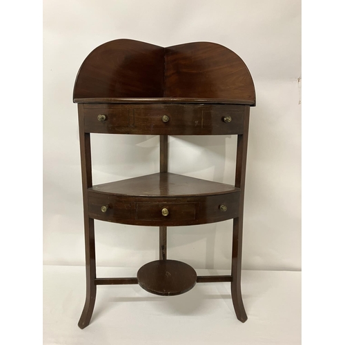 310 - Georgian mahogany corner washstand with later bowls.