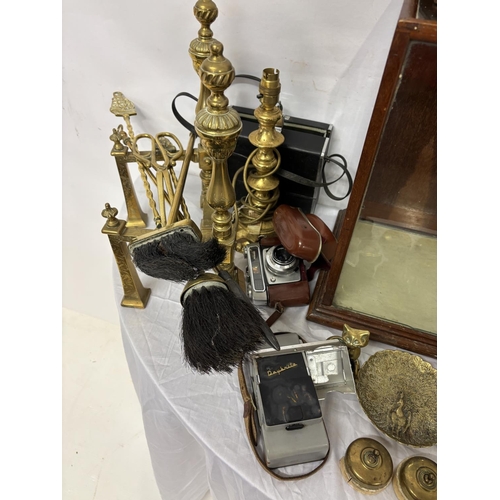 316 - Mixed lot of items to include small display cabinet, clock (not working), brass ware, cameras, etc.