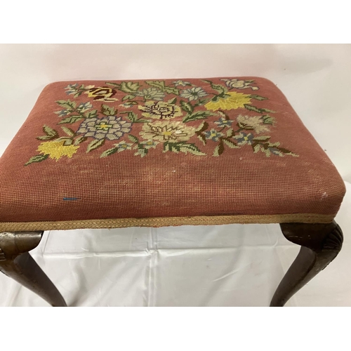 317 - Rectangular shaped stool having needle point upholstery and raised on legs with shell decoration and... 