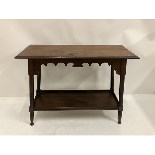 326 - Antique mahogany two tier table with decorative freize. 92cm x 37cm.