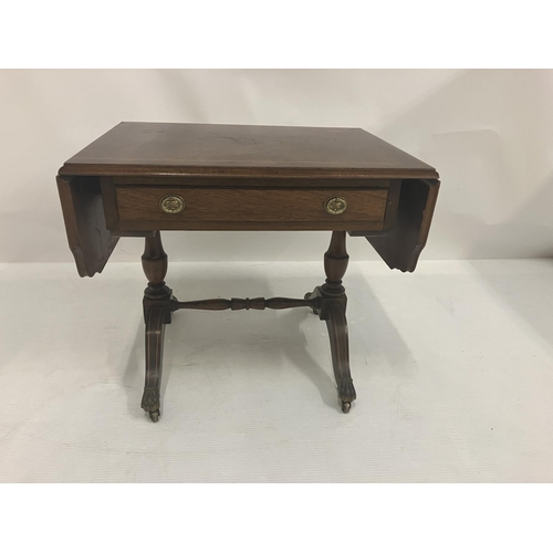 337 - Inlaid mahogany drop leaf occasional table. 60cm x 45cm leaves down, H. 54cm.