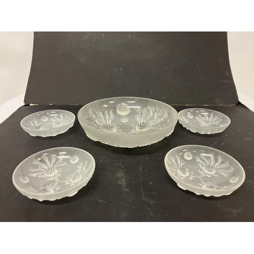 37 - Large frosted glass dish with shaped decoration and four smaller matching bowls.