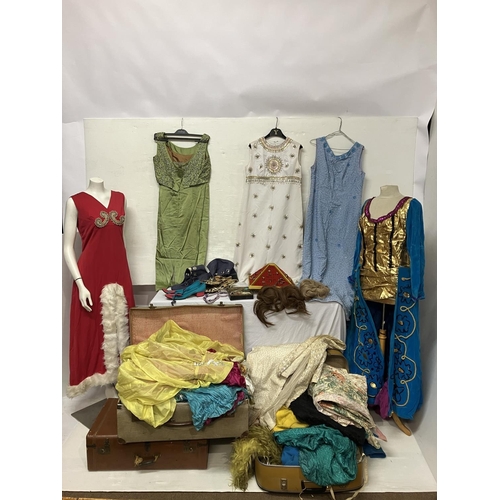 410 - A collection of theatre costumes (drag), shoes, wigs, jewellery, etc.