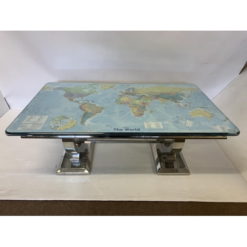 50 - A rectangular shaped coffee table, the top having the map of the world, the decorative base having c... 