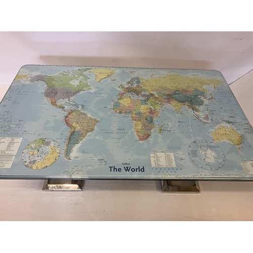 50 - A rectangular shaped coffee table, the top having the map of the world, the decorative base having c... 