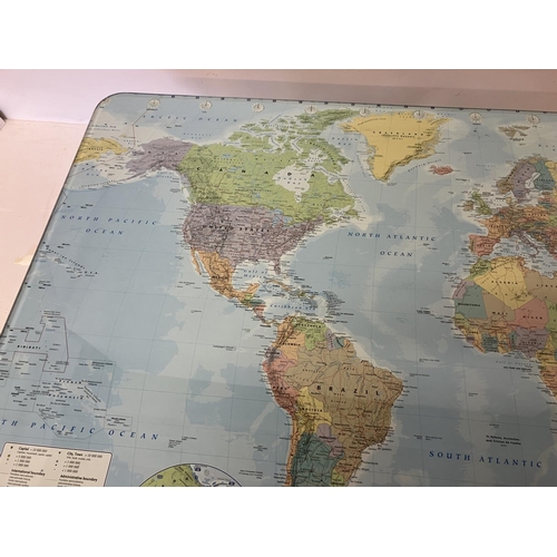 50 - A rectangular shaped coffee table, the top having the map of the world, the decorative base having c... 