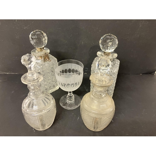 61 - A lot of glassware to include a pair of square shaped cut glass decanters with silver mounts and loc... 