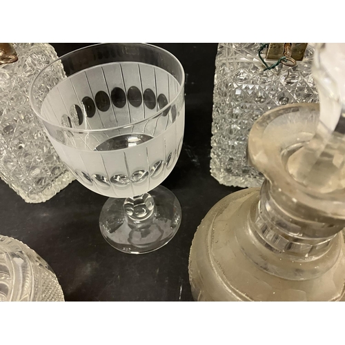 61 - A lot of glassware to include a pair of square shaped cut glass decanters with silver mounts and loc... 