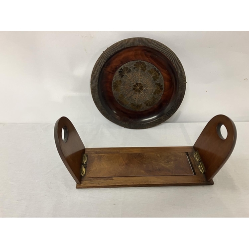 62 - Walnut book ends and a mahogany circular plaque.