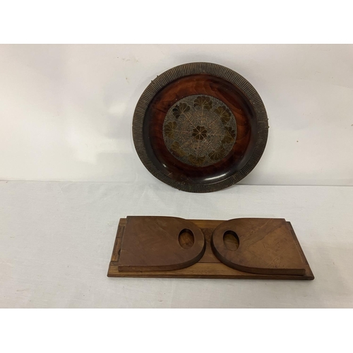 62 - Walnut book ends and a mahogany circular plaque.