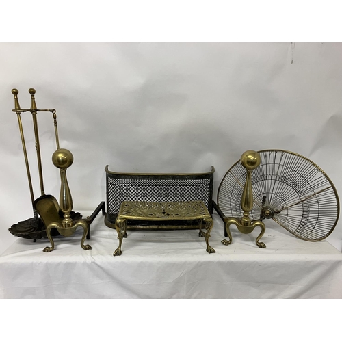 79 - Small brass nursery fender, brass fire irons, large brass fire dogs, fan shaped fire screen and bras... 