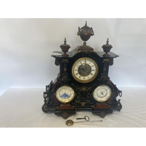 80 - A good large French 19th century mantel clock, the decorative rouge and black marble case fitted wit... 