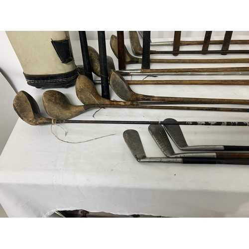 93 - A good collection of old golf clubs with various makers names - T. Morris, J. Webb, J. Fulford, Ches... 