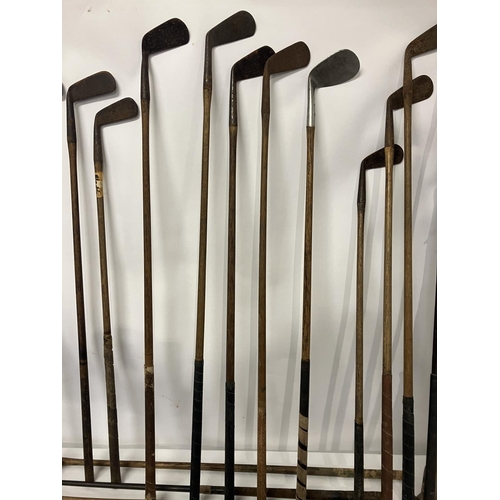 93 - A good collection of old golf clubs with various makers names - T. Morris, J. Webb, J. Fulford, Ches... 