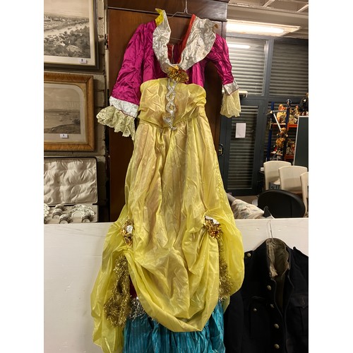 410 - A collection of theatre costumes (drag), shoes, wigs, jewellery, etc.