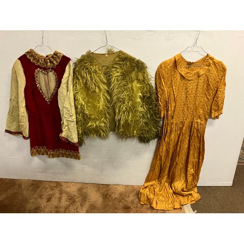 410 - A collection of theatre costumes (drag), shoes, wigs, jewellery, etc.