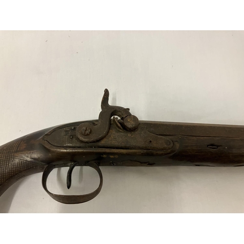 249 - Two antique pistols - one with name and ramrod. AF.