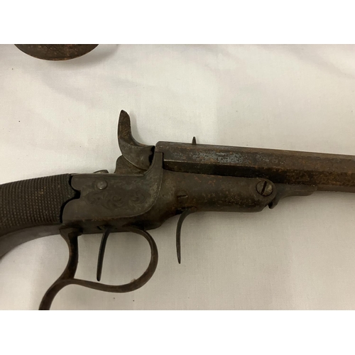 249 - Two antique pistols - one with name and ramrod. AF.