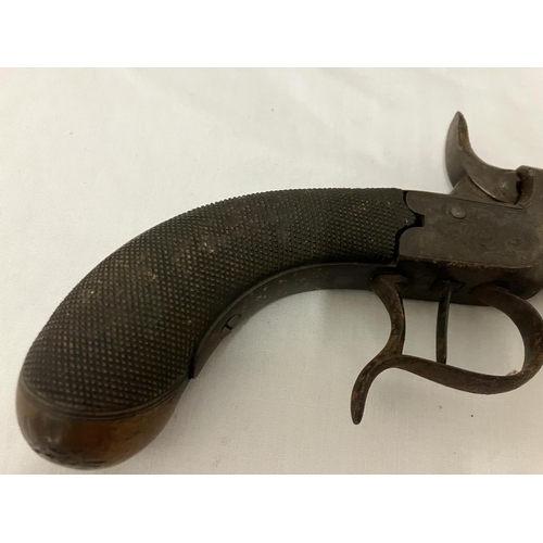 249 - Two antique pistols - one with name and ramrod. AF.