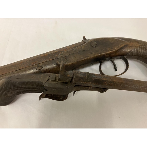 249 - Two antique pistols - one with name and ramrod. AF.