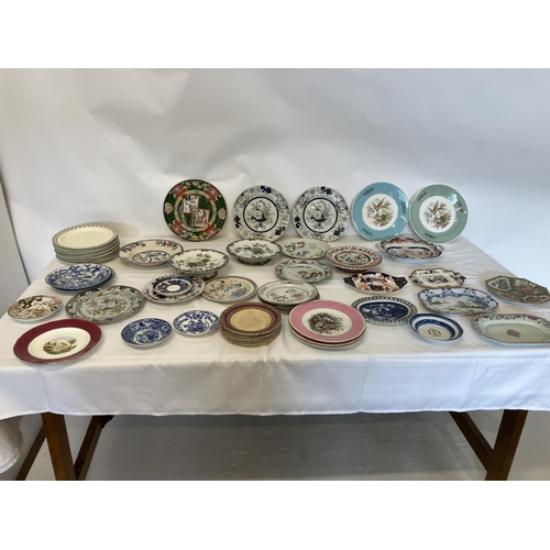 313 - Quantity of old china plates.