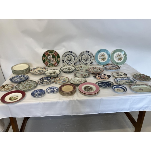313 - Quantity of old china plates.
