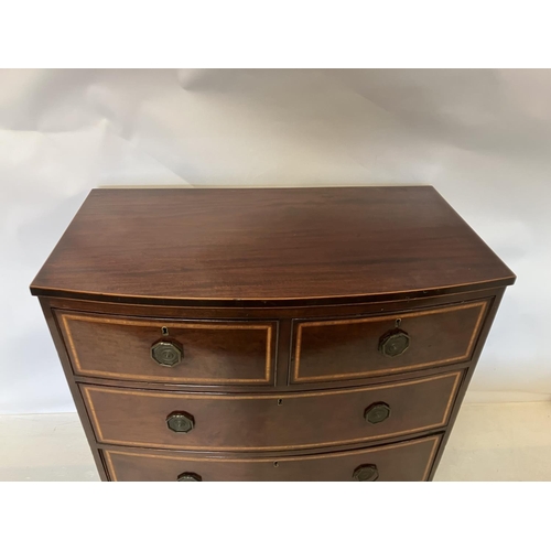 316 - Good antique bow shaped chest of 2 short and 2 long drawers raised on splay feet. (O'Connell, Cork)