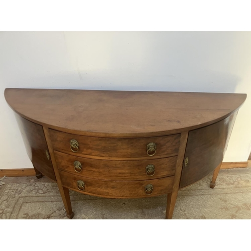 350 - Antique demi lune shaped sideboard fitted with drawers and cupboards and raised on square tapered le... 