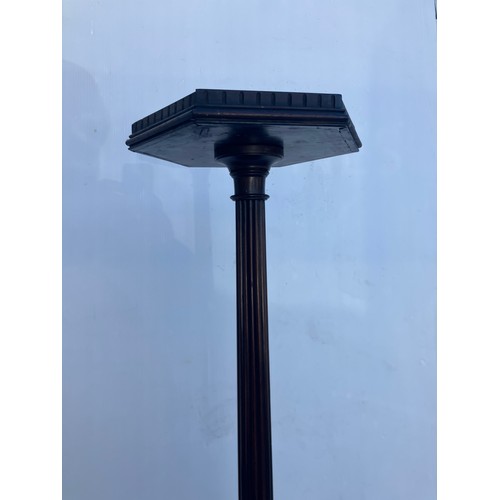 358 - Antique tall mahogany torchere or plant stand on tripod base.