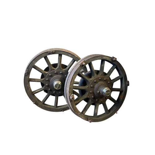 102 - A pair of old Buick hickory timber spoke wheels. Diameter 60cm approx.