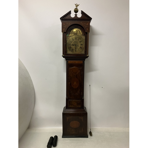 120 - An 18th century Irish long cased clock by Phil Glasco, Dublin having arched brass dial and inlaid ma... 
