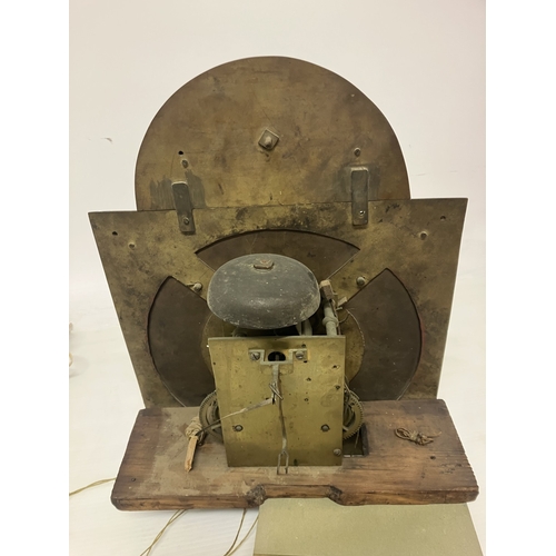 120 - An 18th century Irish long cased clock by Phil Glasco, Dublin having arched brass dial and inlaid ma... 