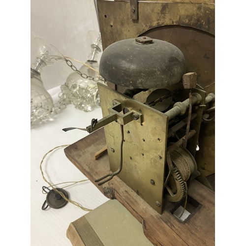 120 - An 18th century Irish long cased clock by Phil Glasco, Dublin having arched brass dial and inlaid ma... 