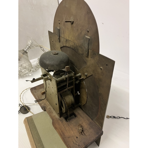 120 - An 18th century Irish long cased clock by Phil Glasco, Dublin having arched brass dial and inlaid ma... 