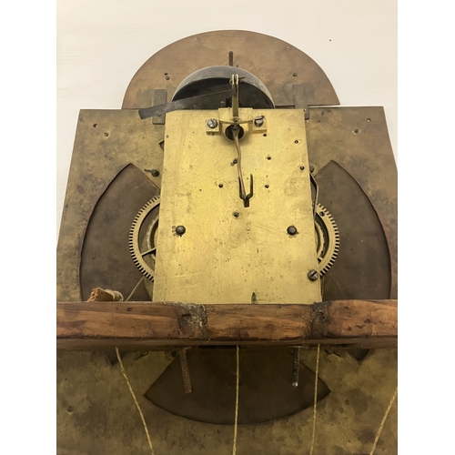 120 - An 18th century Irish long cased clock by Phil Glasco, Dublin having arched brass dial and inlaid ma... 