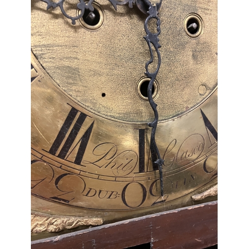 120 - An 18th century Irish long cased clock by Phil Glasco, Dublin having arched brass dial and inlaid ma... 