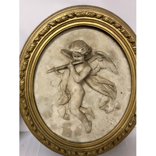 107 - A pair of antique plaques - musicians in original oval gilt frames. Overall size 55cm x 47cm.