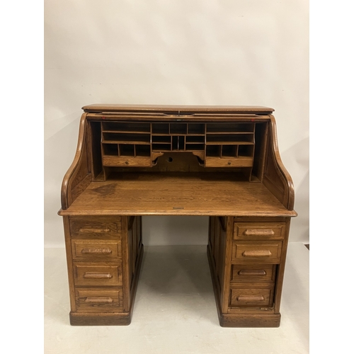 37 - Victorian oak roll top desk lacking centre drawer and needing attention.