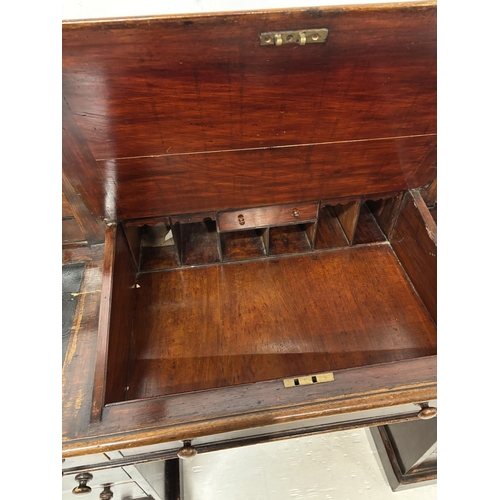 62 - Victorian mahogany Dickens style desk. W. 144cm.