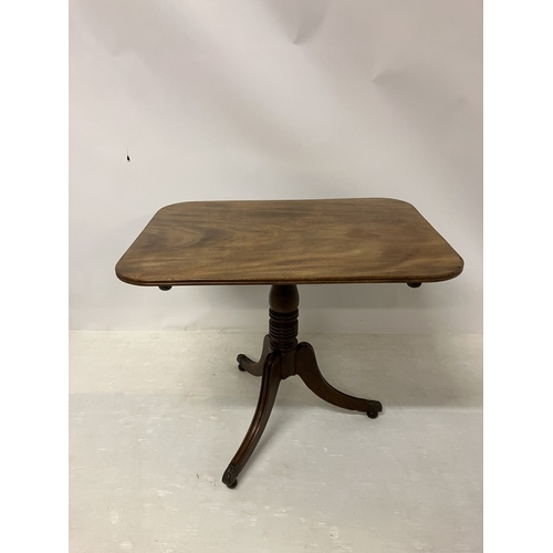 83 - Regency mahogany wine or tea table raised on turned column and tripod base with brass toe castors. W... 