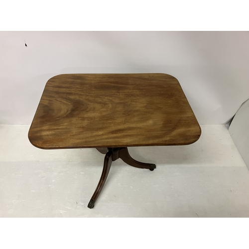 83 - Regency mahogany wine or tea table raised on turned column and tripod base with brass toe castors. W... 
